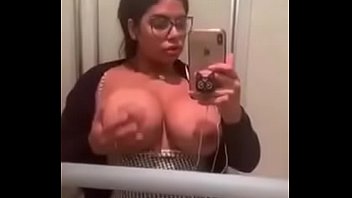 Armenian slut showed her big tits in the bathroom on the phone